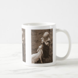 De Café Alimentando a las cabras la taza