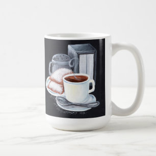De Café Cafe du Monde en la taza blanca negra