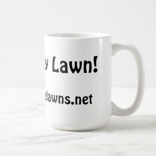 De Café Coma su taza del césped