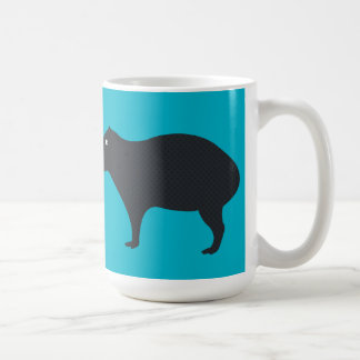 De Café El Capybara está mirando la taza