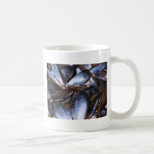 De Café El mejillón descasca la taza