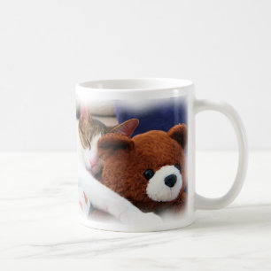 De Café Gatito el dormir con la taza del peluche