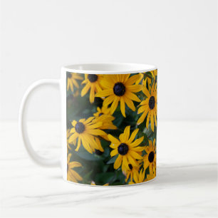 De Café Susan Negro-observada florece la taza
