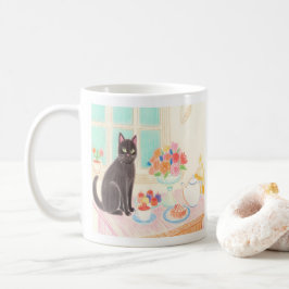 De Café Taza con gato negro lindo en la fiesta del té