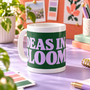 De Café Taza con tipografía floral Ideas in Bloom en negri