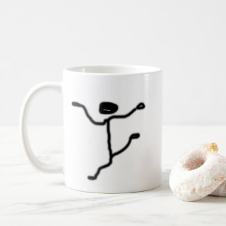 De Café taza con una pequeña figura