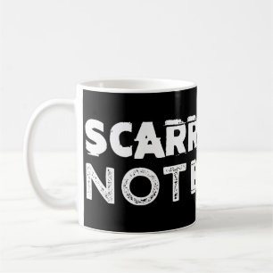 De Café Taza marcada con una cicatriz pero no rota del