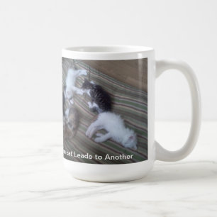 De Café Un gato lleva a otra taza
