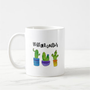 De Café Vaya se sientan en una taza del cactus