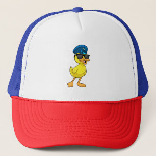 De Camionero Pato como piloto con gorra piloto