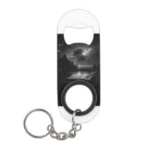 Llave abrebotellas ligado a testigo