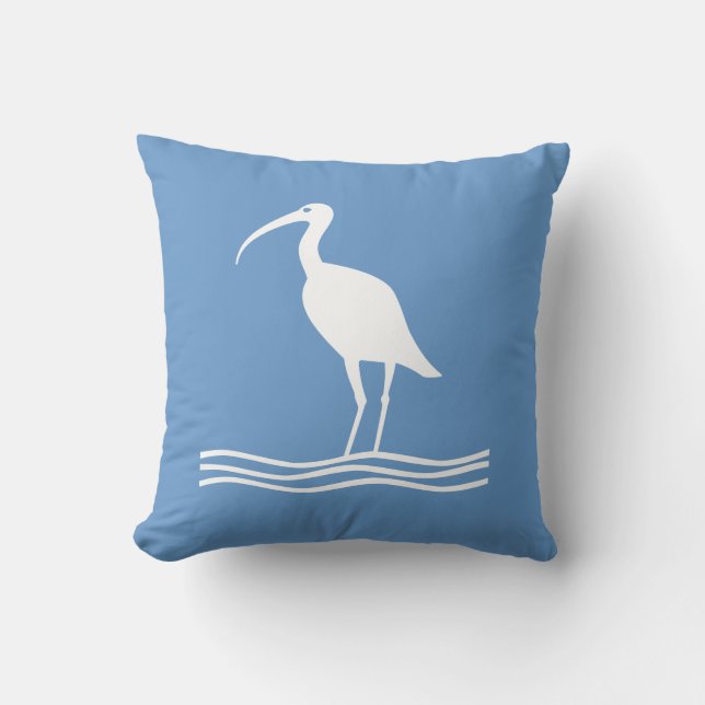 Decorativo AVE MARINA. BLANCO sobre cojín azul turquesa (Anverso)