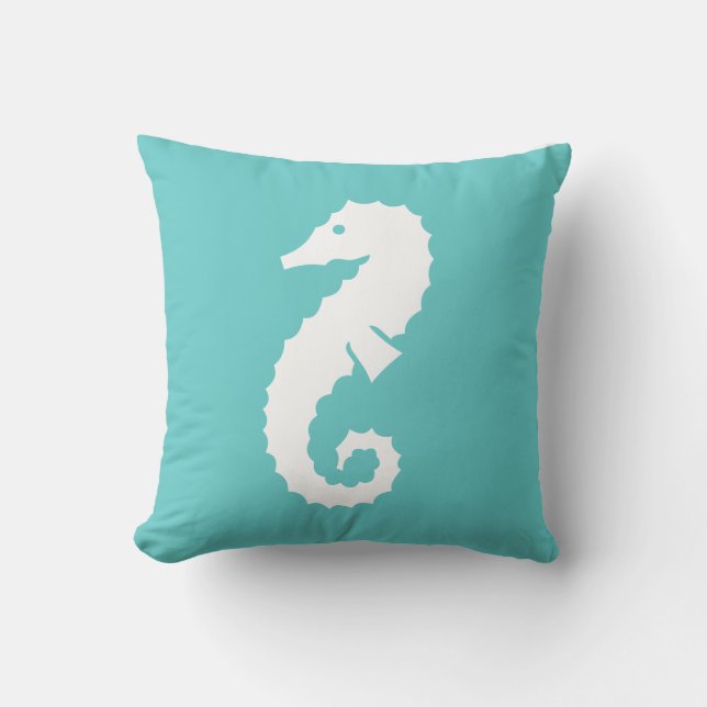 Decorativo CABALLITO DE MAR BLANCO sobre cojín azul turquesa (Anverso)