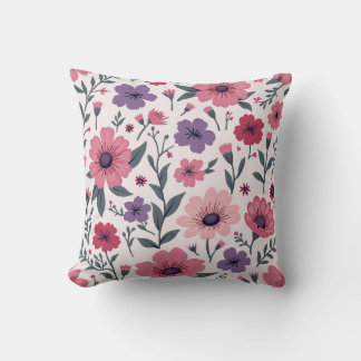 Decorativo Es un cojín mezclado con flores rosas y moradas.