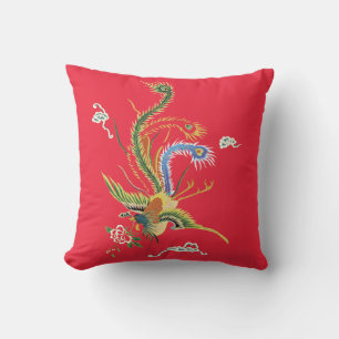 Decorativo Faisán oriental sobre cojín rojo brillante