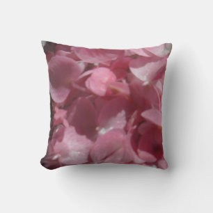 Decorativo geranios rosados : cojín rosa claro casi sólido