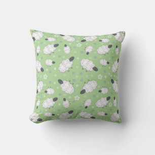 Decorativo Ovejas y flores en cojín verde