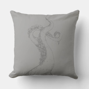Decorativo tentáculos de pulpo grises sobre cojín gris