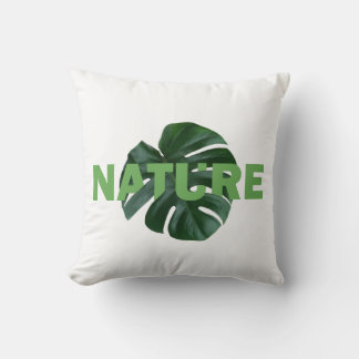 deja monstera en el almohada de tiro blanco