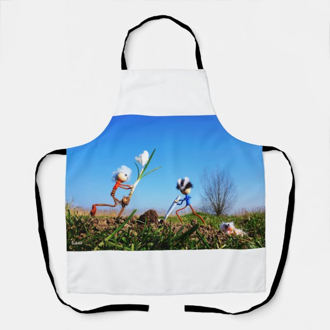 Delantal 2 Fubby's die een bol krokus planten. (Anverso)
