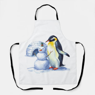 Delantal Acuarela Pingüino construyendo una nieve