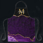 Delantal Agitación de mármol morado y dorado<br><div class="desc">Este delantal cuenta con un elegante y glamuroso fondo de mármol agate con detalles de piedra de gema geodésica y acentos falsos de purpurina de oro. El monograma combina el guión manuscrito y las fuentes sans serif modernas para un aspecto elegante y sofisticado. Esto hará el regalo ideal ya que...</div>
