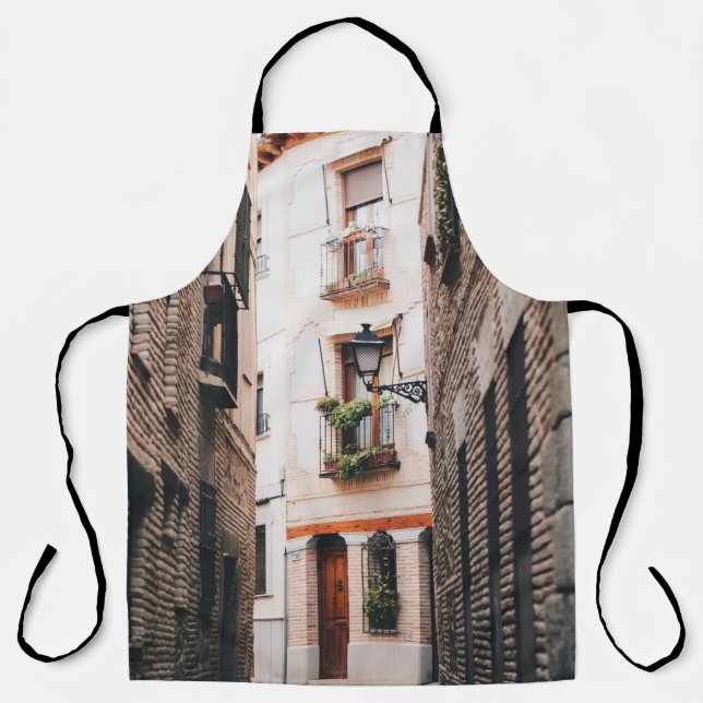 DELANTAL ALEGRÍA DE CONCRETO GRIS DURANTE EL DÍA (Anverso)