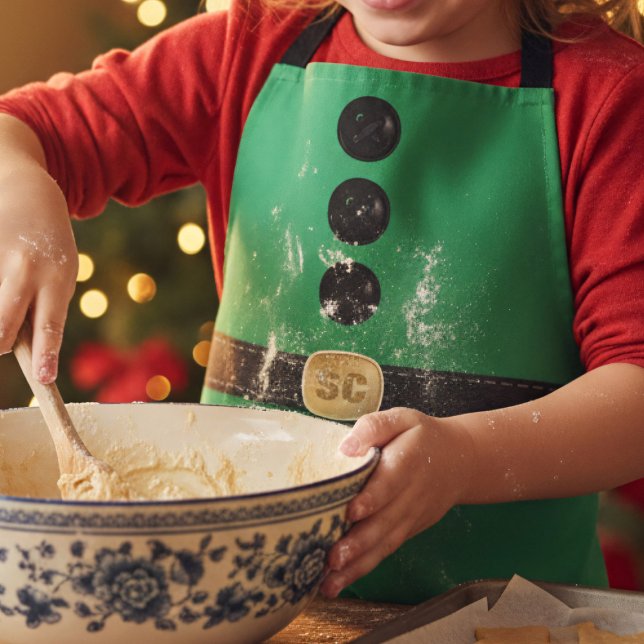 Delantal Apran de vestuario de elfo verde de Navidades hábi (A fun and festive green elf costume Christmas apron with space for your initials)