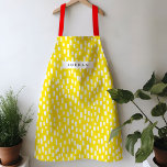 Delantal Apron<br><div class="desc">Luminoso y alegre,  este delantal de colores vivos presenta guiones dibujados a mano para un juego de patrones durante todo el año. Personaliza con tu propio nombre o dá como un regalo práctico y atento!</div>