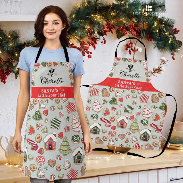 Delantal Apron, el pequeño chef Sous de Santa (Create delicious holiday meals this season in this adorable Santa's Little Sous Chef Apron.)