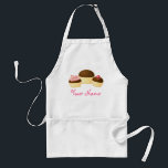 Delantal Apron Ladies personalizadas para el pastel<br><div class="desc">Este cutáneo de adultos tamaño Cupcake Kitchen Apron tiene un trío de quequitos de chocolate con un nombre rosa personalizado que puedes cambiar para hacer un regalo personalizado para cualquier amante de quequitos que hornea. ¿Quién podría resistir el trío de quequitos de chocolate?</div>