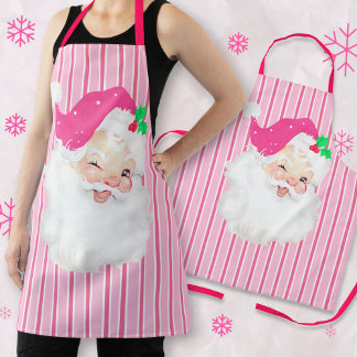 Delantal Apron Navidades retro de Santa Wink rosa caliente