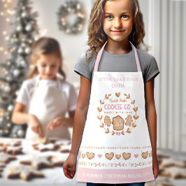 Delantal Apron, un niño pequeño que hace galletas a Navidad