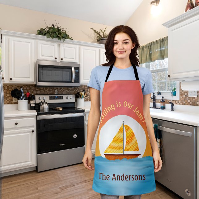 Delantal Barco de vela ilustrado en alba de agua al atardec (llustrated Sailboat On Water Moonrise at Sunset Apron)