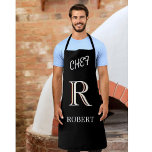 Delantal Black and White Personalized Monogram and Name<br><div class="desc">This unique designer  apron for your chef features a three color monogram — look closely and you will see for yourself.  This is set against a black background .   Any design questions,  just send an email to charmdesignstudio@rcn.com and we’ll be delighted to assist.</div>