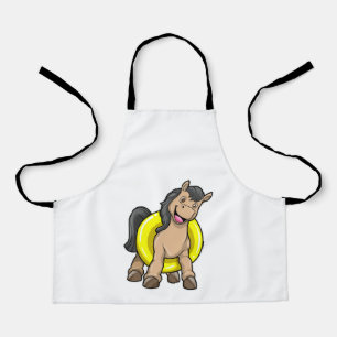 Delantal Caballo en la playa con anillo de natación