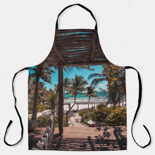 Delantal Cabaña de nipa bajo palmeras de coco