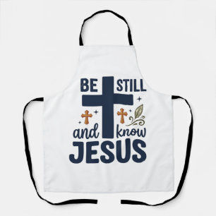 Delantal Camiseta de tipografía cristiana Quédate quieto y 
