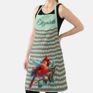 Delantal Cardenal en rama de pino con bayas de invierno