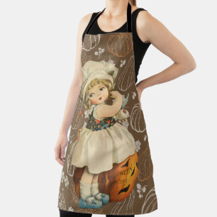 Delantal Chica tallando manzana Halloween