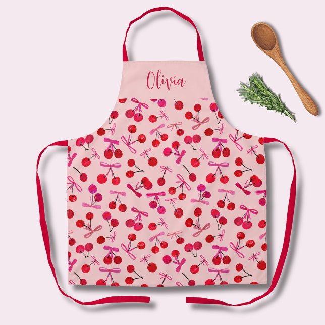 Delantal Cochero Cereza y patrón de lazo (Coquette cherry and bow girly pattern pink kitchen apron. Personalize with your own name or initials)