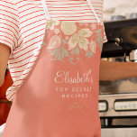 Delantal Cocina florida rústica y elegante<br><div class="desc">El delantal de moda rústico vintage personalizado del chef, con su delicado rosa rosa, crema de pavo y floridas flores silvestres florales de color verde, bordea un fondo de naranja de coral. Puede ser un hermoso regalo para tu propia cocina o un regalo personalizado para alguien especial, aniversario, cumpleaños, Navidades,...</div>