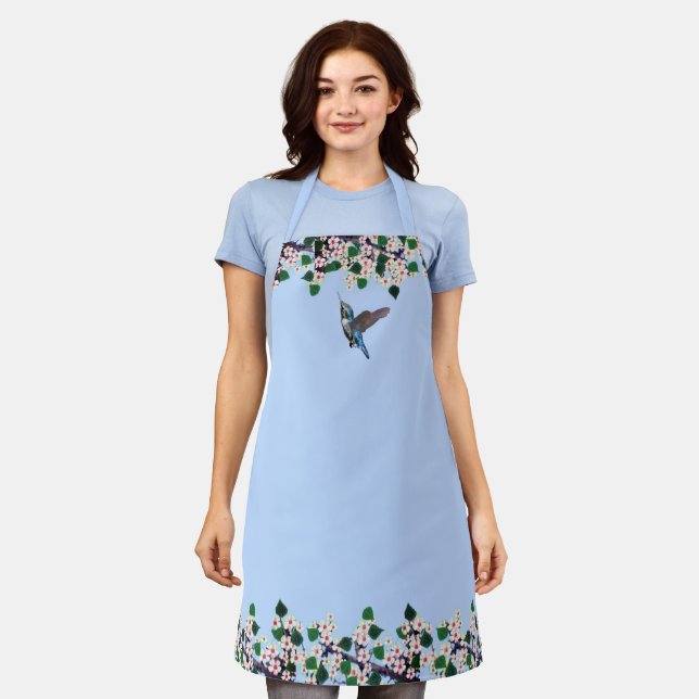 Delantal Colibrí y flores blancas sobre azul claro (Gastado)