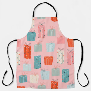 Delantal Colorful Christmas gifts on a pink background. Sea
