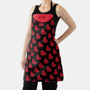 Delantal Corazones rojos con patrón de rayas sobre negro