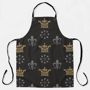 Delantal Crownes dorados sobre fondo de escritorio negro, p