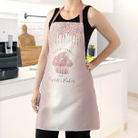 Delantal Cupcake Bakery Rose Gold Glitter Drips Typography<br><div class="desc">Here’s a wonderful way to add to the fun of baking. Add extra sparkle to your culinary adventures whenever you wear this elegant, sophisticated, simple, and modern apron. A sparkly, rose gold cupcake, script handwritten typography and glitter drips overlay a girly faux metallic rose gold ombre background. Personalize with your...</div>