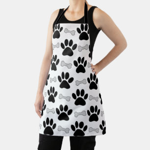 Delantal de adulto con estampado de patas y huesos