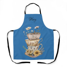 Delantal de margaritas y tazas de té