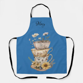 Delantal de margaritas y tazas de té